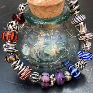 Trollbeads bracelet, 9 glass, 1 prism, 11 sterling beads.